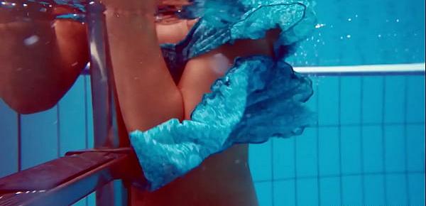  Sexy tight teen Marusia swims naked underwater